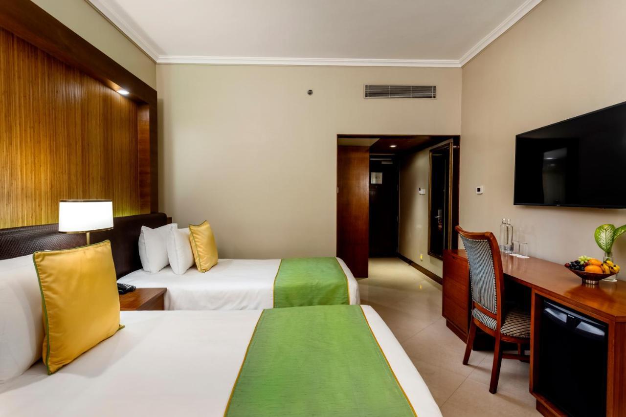 Caravela Beach Resort Varca Exterior foto A room at the hotel