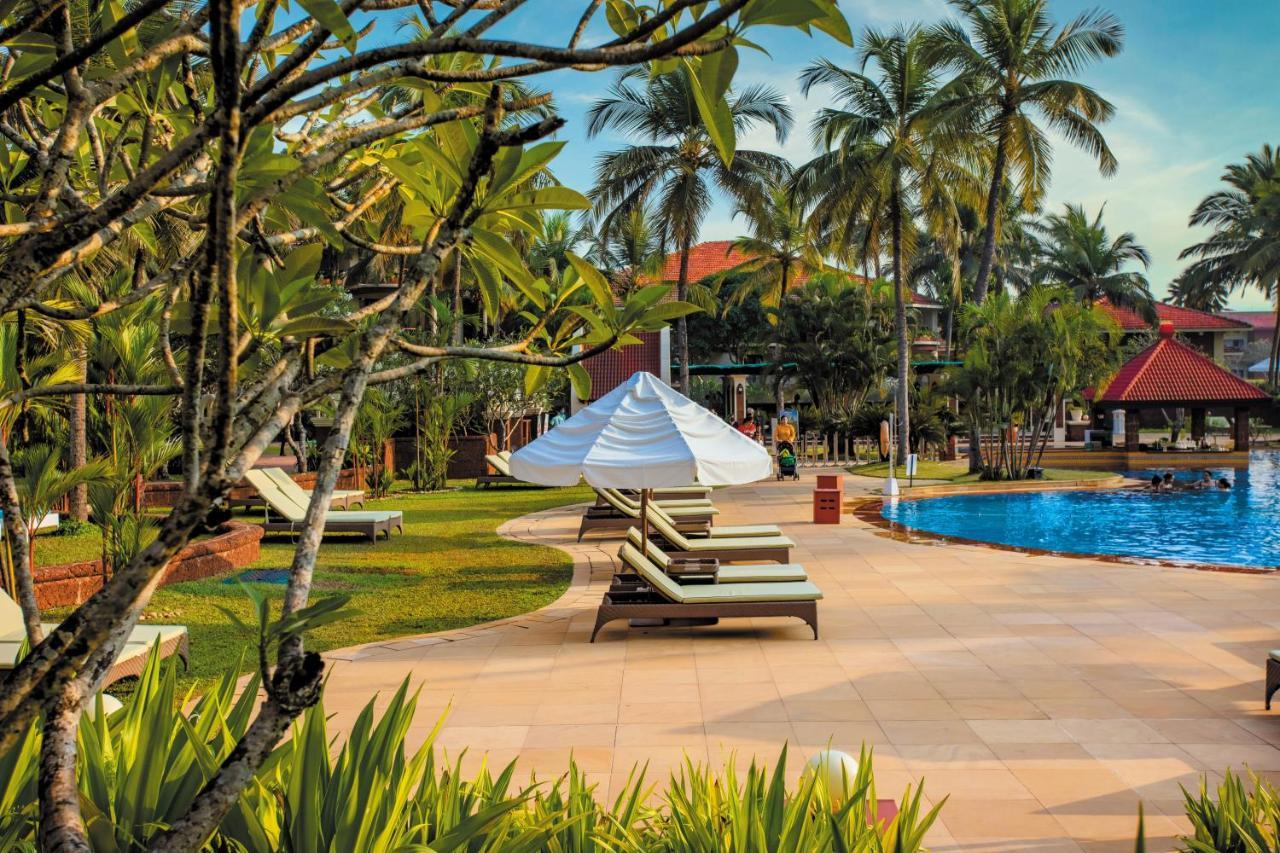 Caravela Beach Resort Varca Exterior foto The pool at the Angsana Resort and Spa, Phuket